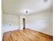 Bright, spacious bedroom featuring wood-look flooring and a closet at 4074 Green Hawk Trl, Decatur, GA 30035