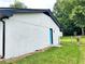 Backside of white brick home has blue door at 4074 Green Hawk Trl, Decatur, GA 30035
