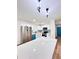 Modern kitchen with white cabinets, stainless steel appliances, and a marble countertop island at 4074 Green Hawk Trl, Decatur, GA 30035