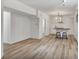 Basement kitchenette area with barstool seating and modern light fixture at 4990 Sawgrass Nw Pl, Acworth, GA 30102