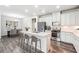 Modern kitchen with stainless steel appliances, granite countertops, and an open island with seating at 791 Belrose Dr, Smyrna, GA 30080