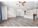 Open-concept living room with hardwood floors and a well-equipped kitchen, perfect for modern living at 791 Belrose Dr, Smyrna, GA 30080