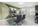 Well-lit home office with a large desk, comfortable chairs, and ample space for work or study at 791 Belrose Dr, Smyrna, GA 30080