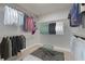 Organized walk-in closet with shelving and hanging space for optimal storage at 791 Belrose Dr, Smyrna, GA 30080