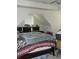 Bedroom with unique angled ceiling, neutral walls, and standard window at 4750 Crinklepoint Ct, Douglasville, GA 30134