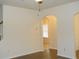 Open-concept living room showing archway, recessed lighting, and new hardwood flooring at 4750 Crinklepoint Ct, Douglasville, GA 30134