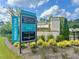 Community entrance sign for Ward's Crossing, new townhomes from the $700's, energy star certified at 1005 Crown Oak St # 44, Johns Creek, GA 30022