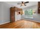 Bedroom with hardwood floors, a window, and ample closet space at 2525 Millwater Xing, Dacula, GA 30019
