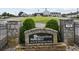 Stone entrance to Hamilton Mill Golf & Country Club, showing signage, landscaping, and the clubhouse in the background at 2525 Millwater Xing, Dacula, GA 30019