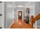 Inviting foyer with hardwood floors and a beautiful entry door with leaded glass at 2525 Millwater Xing, Dacula, GA 30019
