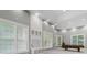 Large game room with built-in shelving and a pool table for entertaining at 2525 Millwater Xing, Dacula, GA 30019