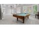 Spacious game room featuring a pool table, large windows, recessed lighting, and neutral walls at 2525 Millwater Xing, Dacula, GA 30019