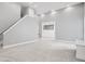 Open-concept living area with neutral colors and ample natural light at 2525 Millwater Xing, Dacula, GA 30019