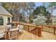 Deck overlooking backyard with a table and chairs, ideal for outdoor entertaining at 340 Old York Rd, Johns Creek, GA 30097