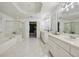 Large bathroom offering a walk-in shower, soaker tub, and double vanity with granite countertops and ample storage at 340 Old York Rd, Johns Creek, GA 30097