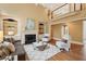 Spacious living room boasts a fireplace, built-in bookshelves, and comfortable seating at 340 Old York Rd, Johns Creek, GA 30097