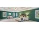 Spacious main bedroom featuring a trey ceiling, fan, sitting area, and decorative accents for a comfortable retreat at 340 Old York Rd, Johns Creek, GA 30097