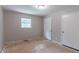 Standard bedroom featuring neutral grey walls and a double door closet at 6293 Silver Creek Ln, Austell, GA 30168
