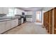 Bright kitchen with stainless steel appliances, white cabinets and granite countertops at 6293 Silver Creek Ln, Austell, GA 30168