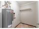 Utility room featuring a newer hot water heater at 6293 Silver Creek Ln, Austell, GA 30168