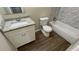 Updated bathroom featuring a granite vanity, modern fixtures, and tile accents at 1026 Eisenhower Se Ct, Atlanta, GA 30354