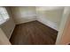 A clean, empty bedroom featuring wood floors and natural light at 1026 Eisenhower Se Ct, Atlanta, GA 30354