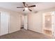 Bedroom showcasing carpeted floors and ceiling fan at 1026 Eisenhower Se Ct, Atlanta, GA 30354