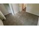 Bedroom features carpet and a closet at 1026 Eisenhower Se Ct, Atlanta, GA 30354