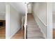 Inviting entryway with hardwood floors and a staircase leading to the upper level at 1192 Melton Sw Dr, Lilburn, GA 30047