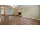 Open floor plan with fireplace and hardwood floors. Windows provide lots of natural light at 2563 Creek Ter, Snellville, GA 30078