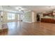Inviting living room featuring hardwood floors and lots of natural light from large windows at 2563 Creek Ter, Snellville, GA 30078