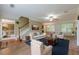 Cozy living room with a staircase and an adjoining dining room at 2563 Creek Ter, Snellville, GA 30078