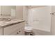 The bathroom has a vanity, toilet, and shower/tub combination at 4164 Little Nw Spgs, Kennesaw, GA 30144