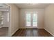Cozy dining room area with ample natural light and wood-look flooring at 4164 Little Nw Spgs, Kennesaw, GA 30144