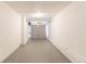 A one car garage with white walls and a light gray floor at 4164 Little Nw Spgs, Kennesaw, GA 30144