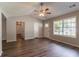 Inviting living room with a large window and wood-look flooring at 4164 Little Nw Spgs, Kennesaw, GA 30144