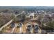 Panoramic aerial view of new construction and neighborhood homes, showing community and scenery at 4420 Ross Estates Ct, Snellville, GA 30039