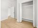 Bedroom with a closet and light wood flooring at 4420 Ross Estates Ct, Snellville, GA 30039