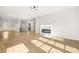 Open concept main level with fireplace and hardwood floors in a new construction home at 4420 Ross Estates Ct, Snellville, GA 30039