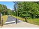A paved walking path through a wooded area provides a scenic route at 64 Harbour Lake Dr, Fayetteville, GA 30215