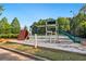 A fenced-in playground offers a safe space for children to play outdoors at 64 Harbour Lake Dr, Fayetteville, GA 30215