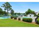 A community pool, tennis court, and lake offer a variety of recreational activities at 64 Harbour Lake Dr, Fayetteville, GA 30215