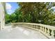 A wide angle shot of the balcony overlooking an array of trees and sky at 9005 Old Southwick Pass, Alpharetta, GA 30022
