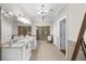 Bright bathroom with double sinks, large mirror, decorative lighting and a large glass enclosed shower at 9005 Old Southwick Pass, Alpharetta, GA 30022