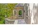 An up-close shot featuring a patio area showcasing the home's architectural details and outdoor space at 9005 Old Southwick Pass, Alpharetta, GA 30022