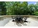 An up-close shot of the patio dining table area showcasing the home's outdoor space at 9005 Old Southwick Pass, Alpharetta, GA 30022