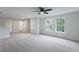 Large bonus room featuring new carpet, natural light, and hall access at 450 Pinevale Ct, Atlanta, GA 30349