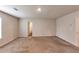 Large bedroom featuring neutral carpet, neutral color walls, and bright natural light at 513 Moline Way, Locust Grove, GA 30248