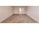 Neutral color bedroom with carpet, walls, door and trim, with natural light at 513 Moline Way, Locust Grove, GA 30248