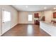 Open-concept kitchen with stainless steel appliances, granite countertops, and a breakfast bar at 513 Moline Way, Locust Grove, GA 30248